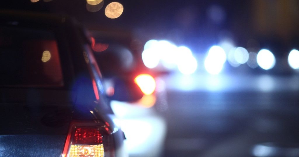 Gouldson lawyers Night road in the city of lights cars traffic jams